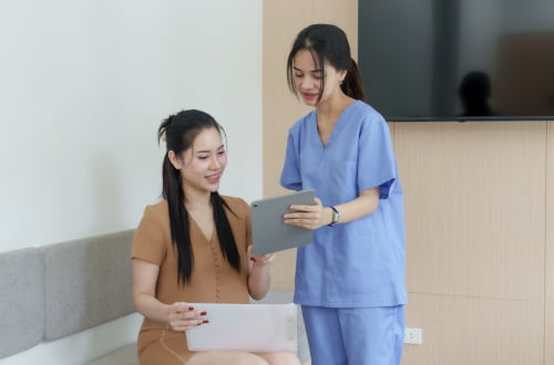 Dentist discussing CDCP coverage and treatment options with a patient at a Markham dental clinic.