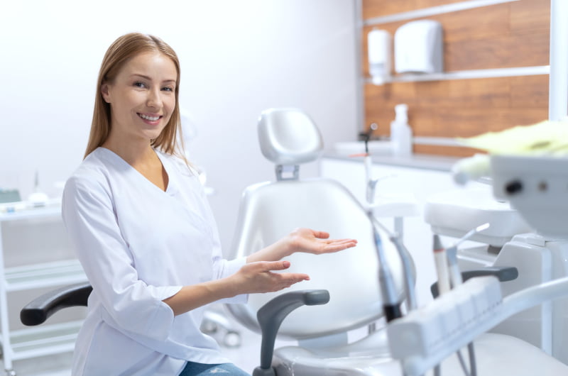 Smiling dentist at Markham Smile Centre providing patient-focused dental care
